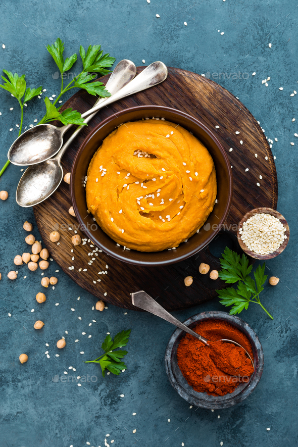 Hummus. Fresh homemade hummus with paprika - Stock Photo - Images