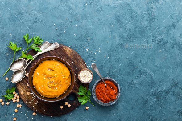 Hummus. Fresh homemade hummus with paprika - Stock Photo - Images
