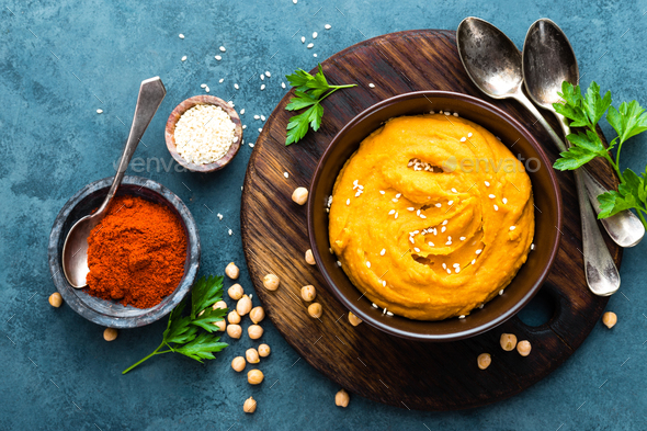Hummus. Fresh homemade hummus with paprika - Stock Photo - Images