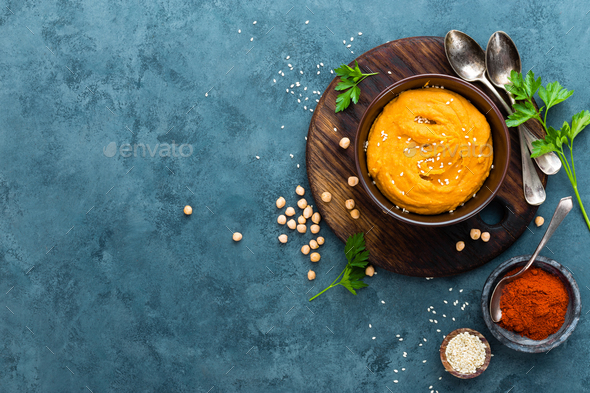 Hummus. Fresh homemade hummus with paprika - Stock Photo - Images