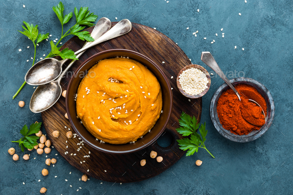 Hummus. Fresh homemade hummus with paprika - Stock Photo - Images