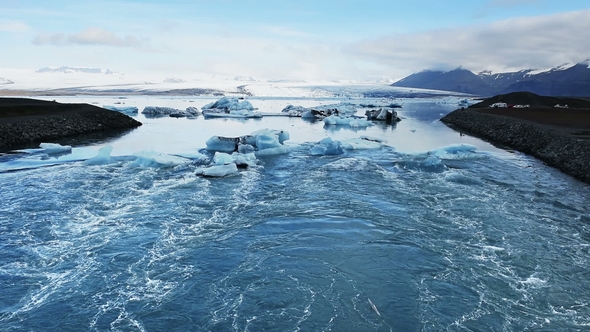 Jokulsarlon Glacier Lagoon, Fantastic Sunset on the Black Beach, Iceland