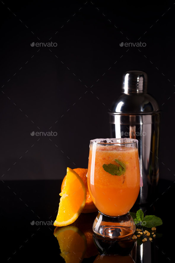 Cocktail Negroni with orange and whiskey on glass black backgorund - Stock Photo - Images