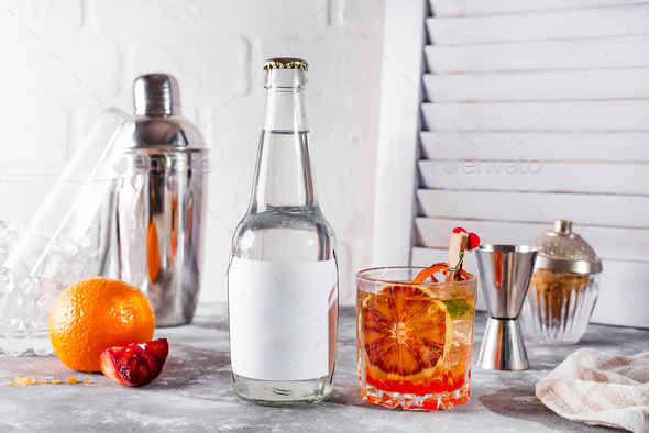 Fresh cocktail with orange and lemon on white wooden background , - Stock Photo - Images