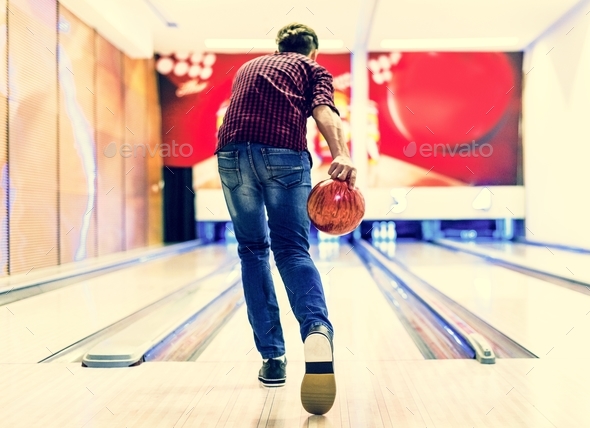 Boy about to roll a bowling ball hobby and leisure concept Stock Photo by Rawpixel