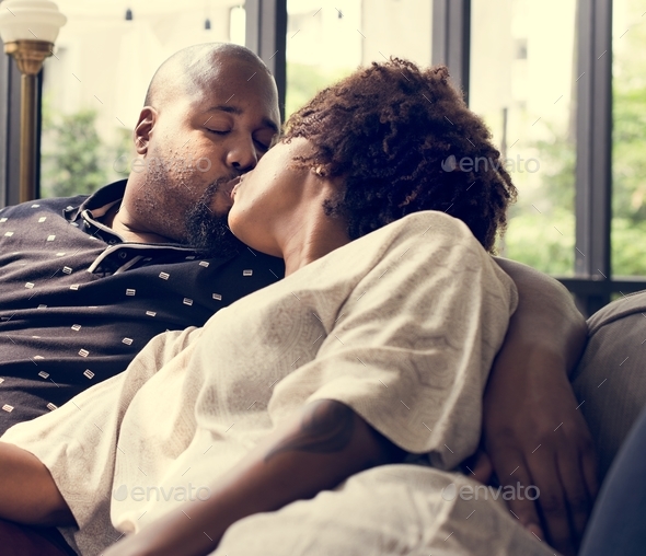 Black couple kissing on the couch Stock Photo by Rawpixel | PhotoDune