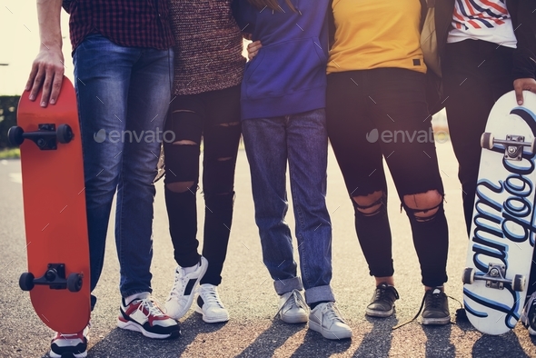 Legs closeup of group of school friends outdoors lifestyle Stock Photo by Rawpixel