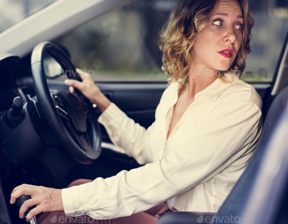 Woman driving a car in reverse Stock Photo by Rawpixel | PhotoDune