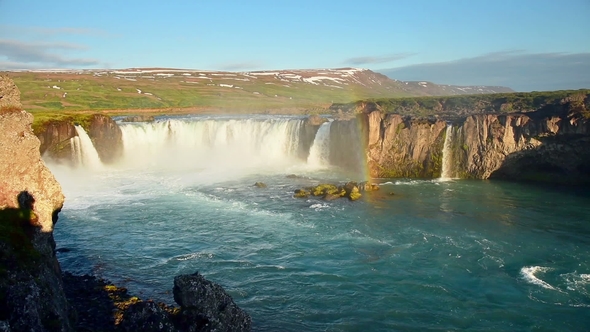 Fantastic Sunset. Hodafoss Very Beautiful Icelandic Waterfall 12 Meters High. It Is Located in the