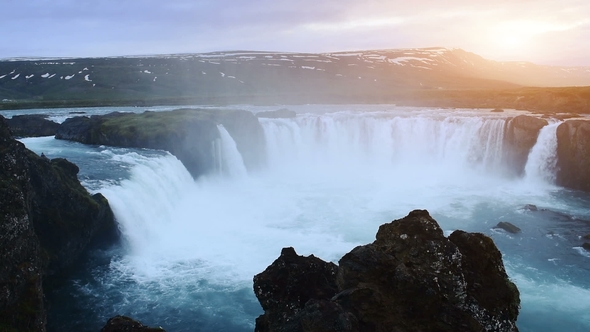 Fantastic Sunset. Hodafoss Very Beautiful Icelandic Waterfall 12 Meters High. It Is Located in the