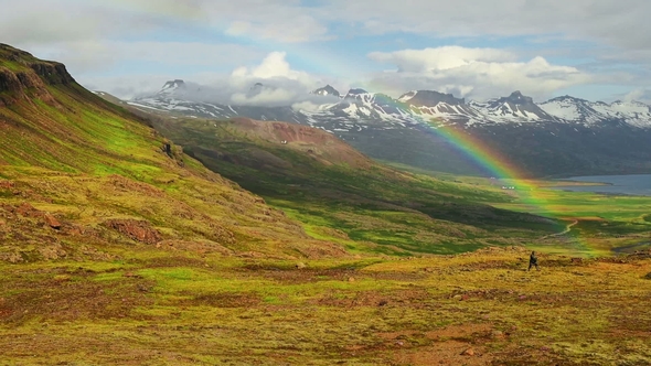 Fantastic View of Rainbow Over a Glacier in Iceland Mountains. Summer Morning. Europe alt
