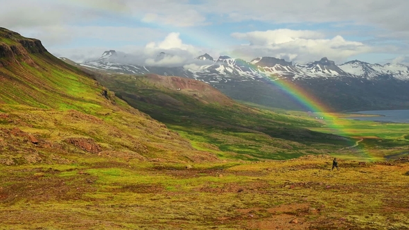 Fantastic View of Rainbow Over a Glacier in Iceland Mountains. Summer Morning. Europe