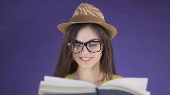 Intelligent Girl Reads Book