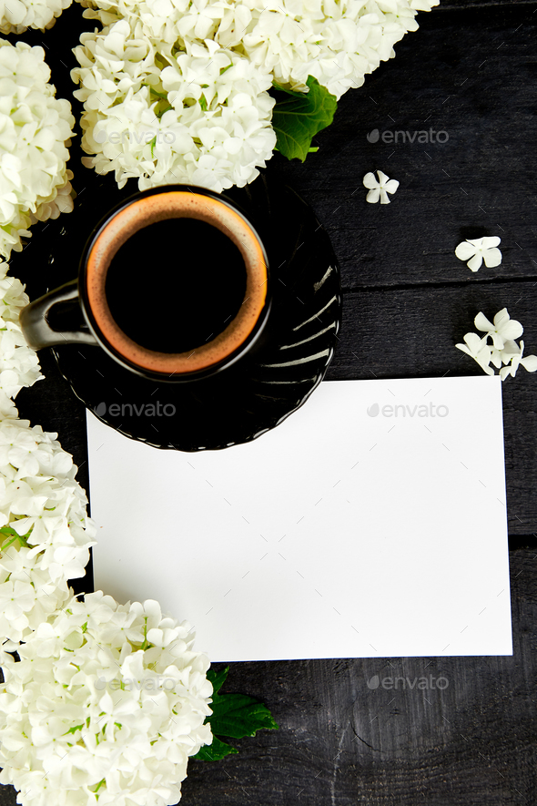 Cup of coffee with bouquet hydrangea - Stock Photo - Images
