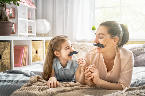 mother and daughter playing - Stock Photo - Images