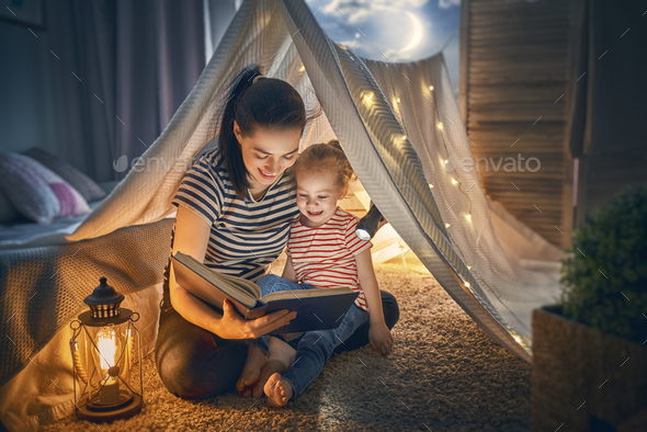 Mom and child reading book - Stock Photo - Images