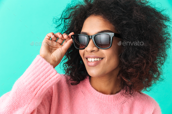 Multicolor image of american woman 20s with afro hairstyle smili - Stock Photo - Images