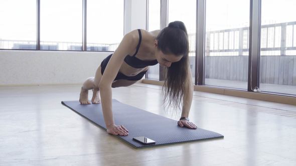 Woman Push-ups Fitness Indoors