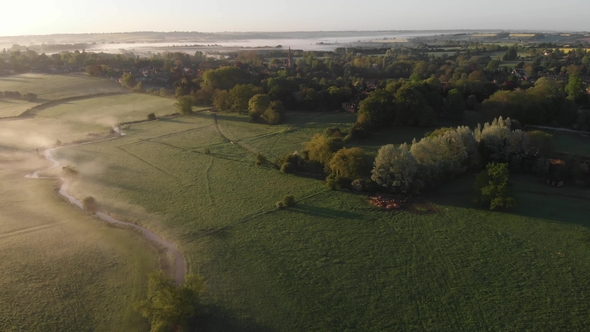 Misty Fields in Morning Birds Eye View