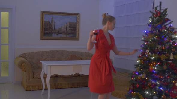 Confident and Beautiful Woman in Red Dress Celebrate Christmas Alone at Home alt