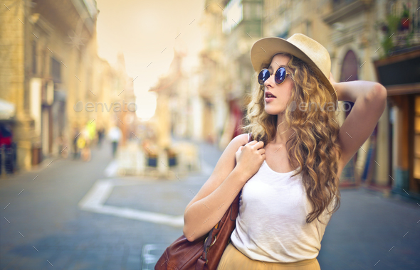 Girl in a downtown street - Stock Photo - Images