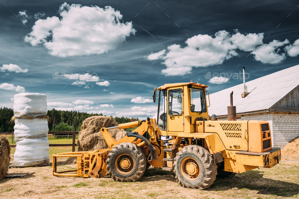 Multipurpose Wheel Loader Carry Out Works In Transportation Of H - Stock Photo - Images