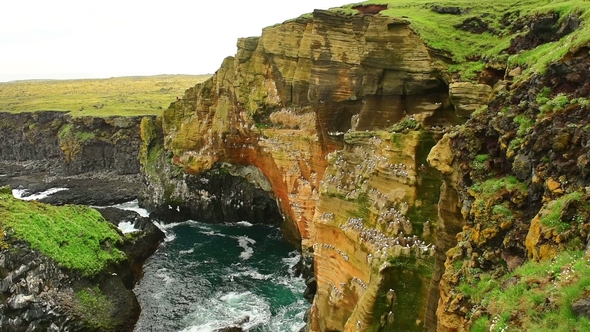Noisy Water Under a Rock. Ocean in the Iceland alt