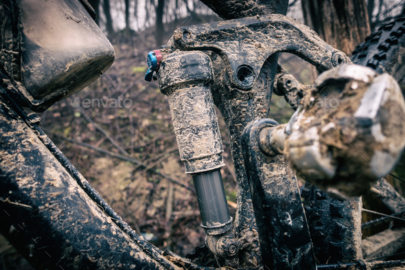 Mountain biking, dirty and broken bicycle closeup - Stock Photo - Images