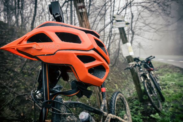 Mountain bike and helmet in autumn woods Stock Photo by blas | PhotoDune