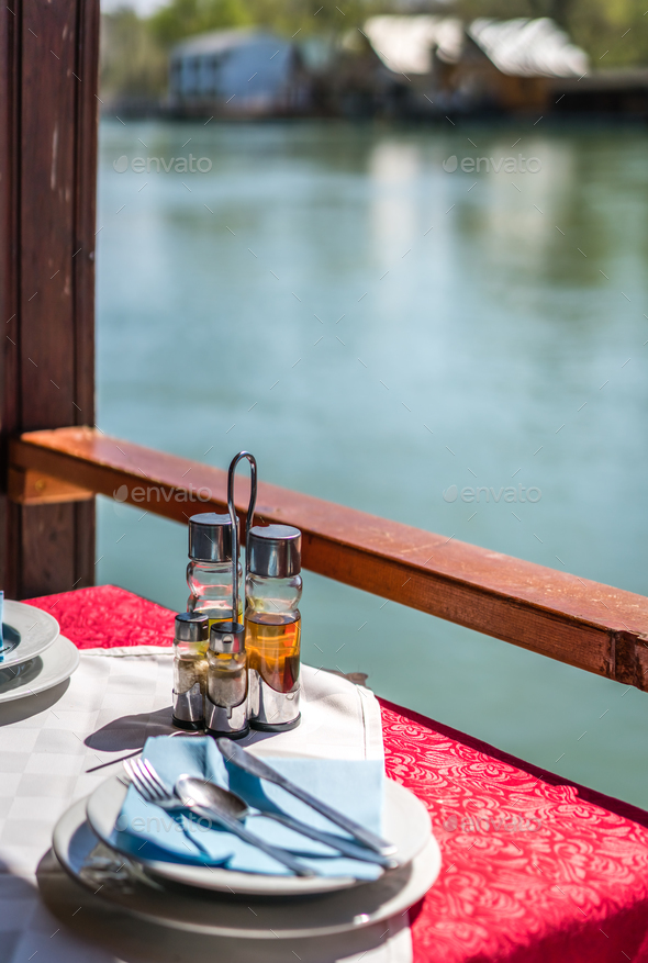 Wooden riverside restaurant in Ada Bojana - Stock Photo - Images