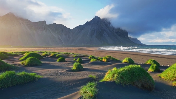 Fantastic West of the Mountains and Volcanic Lava Sand Dunes on the Beach Stokksness, Iceland