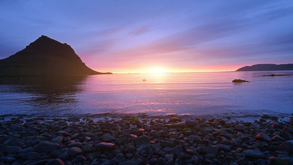 Fantastic Sunset in Iceland with a Sharp Mountain and a Pink Sky Make an Incredible Picture