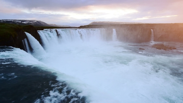 Fantastic Sunset. Hodafoss Very Beautiful Icelandic Waterfall 12 Meters High