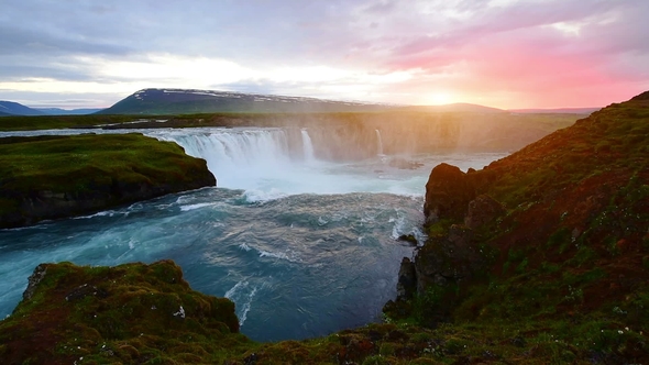 Fantastic Sunset. Hodafoss Very Beautiful Icelandic Waterfall 12 Meters High
