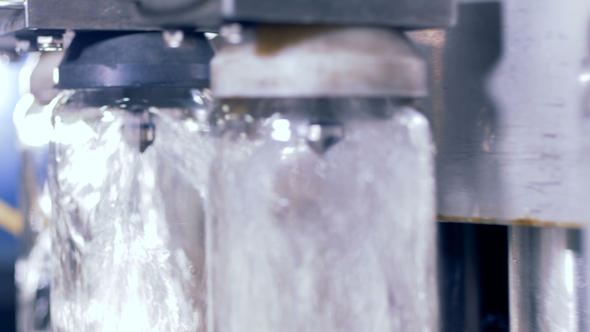 Filling Bottles with Alcohol alt