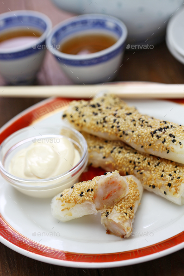 sesame wafer prawn rolls, chinese dim sum Stock Photo by motghnit