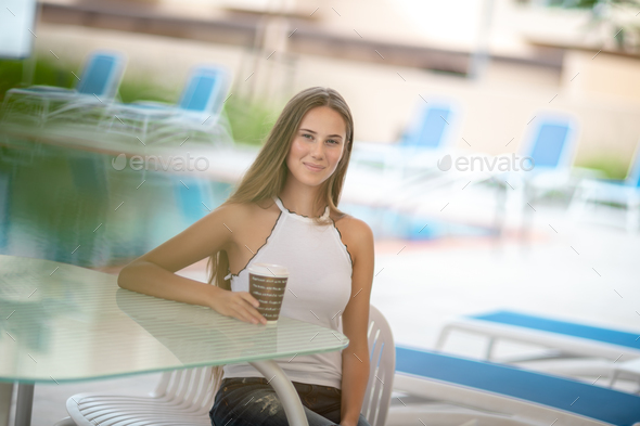 Pretty girl in outdoors cafe - Stock Photo - Images