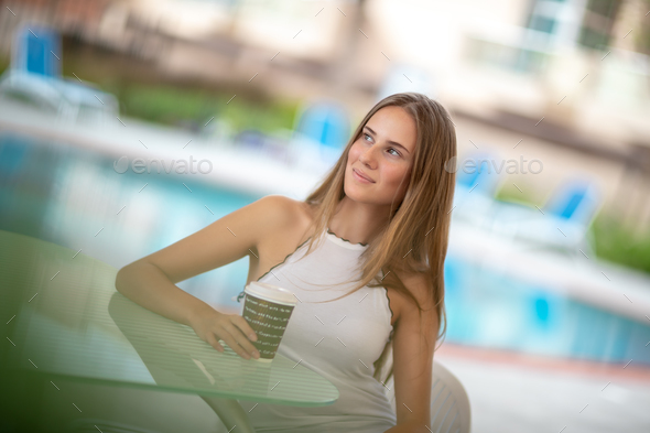 Pretty girl in outdoors cafe - Stock Photo - Images
