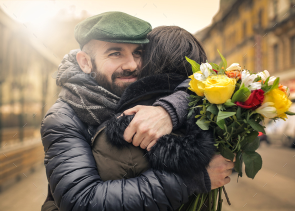 Man and woman hugging - Stock Photo - Images