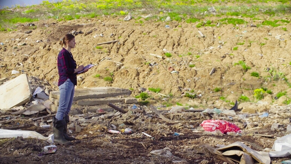 Ecologist During the Research on Garbage Dump