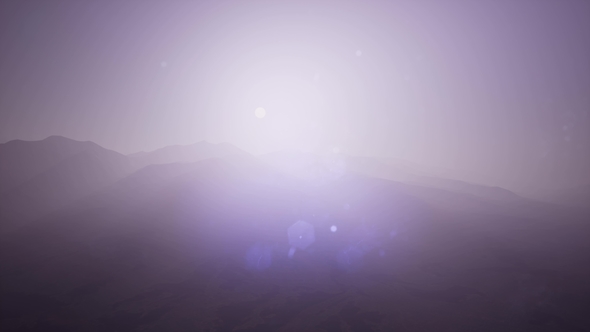 Aerial Green Hills Landscape in Fog