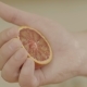Cook Clutching a Fresh and Juicy Grapefruit - VideoHive Item for Sale