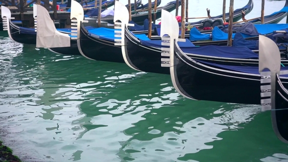 Rows of Traditional Wooden Gondolas alt