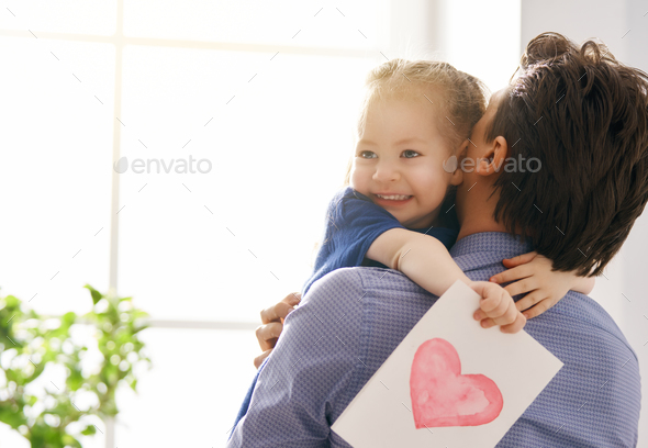 daughter congratulating dad - Stock Photo - Images