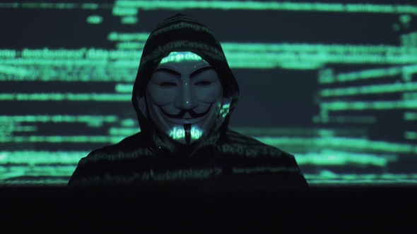 Hacker in the Mask Hacks the Program, Stock Footage | VideoHive