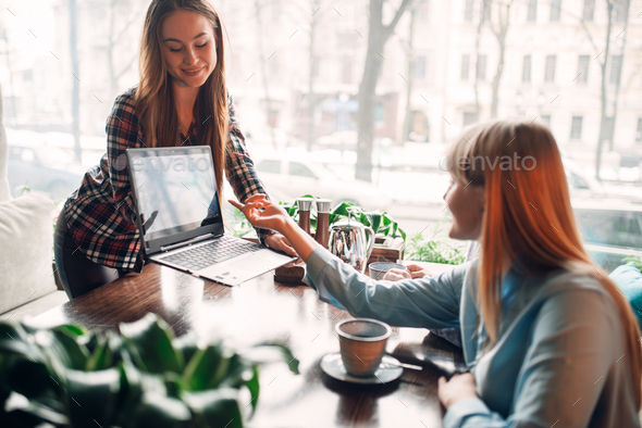 Business presentation on laptop in cafe, marketing - Stock Photo - Images