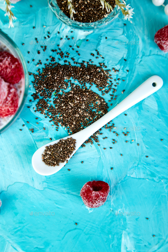 Healthy chia pudding with raspberries in glass - Stock Photo - Images