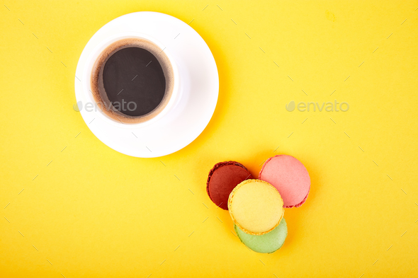 Sweet Dessert Macaron or macaroon with coffee - Stock Photo - Images