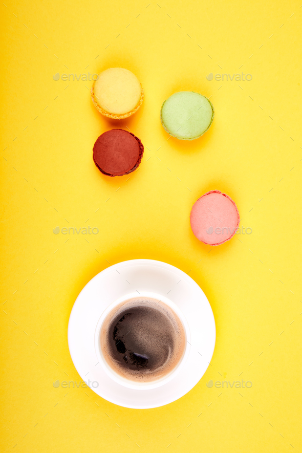 Sweet Dessert Macaron or macaroon with coffee - Stock Photo - Images