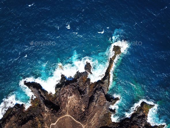Top view of a deserted coast. Rocky shore of the island of Tener Stock Photo by vlad_star